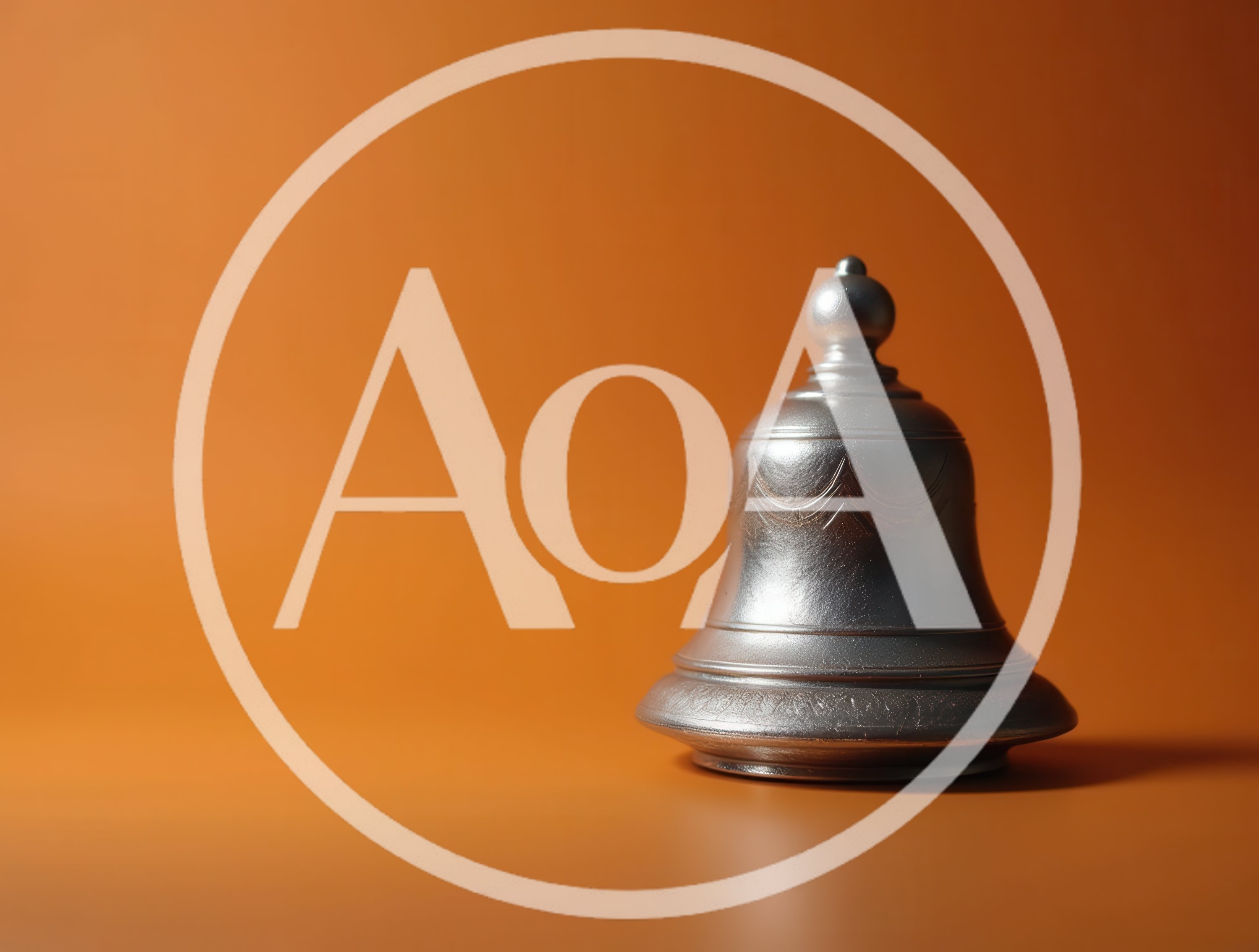 Silver Bell Isolated On A Solid Orange Background