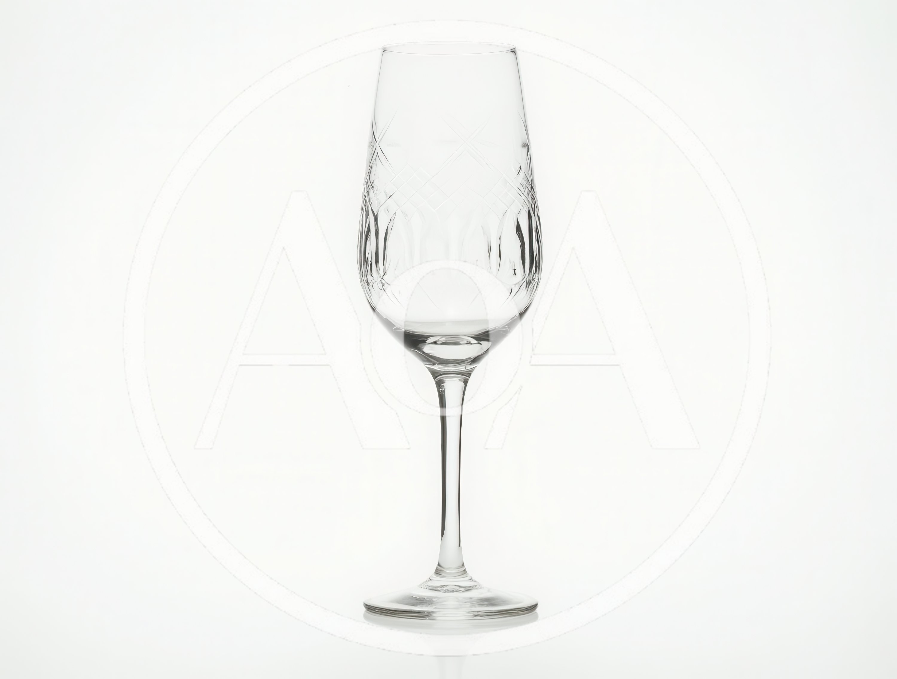 Elegant Etched Crystal Wine Glass On White Background