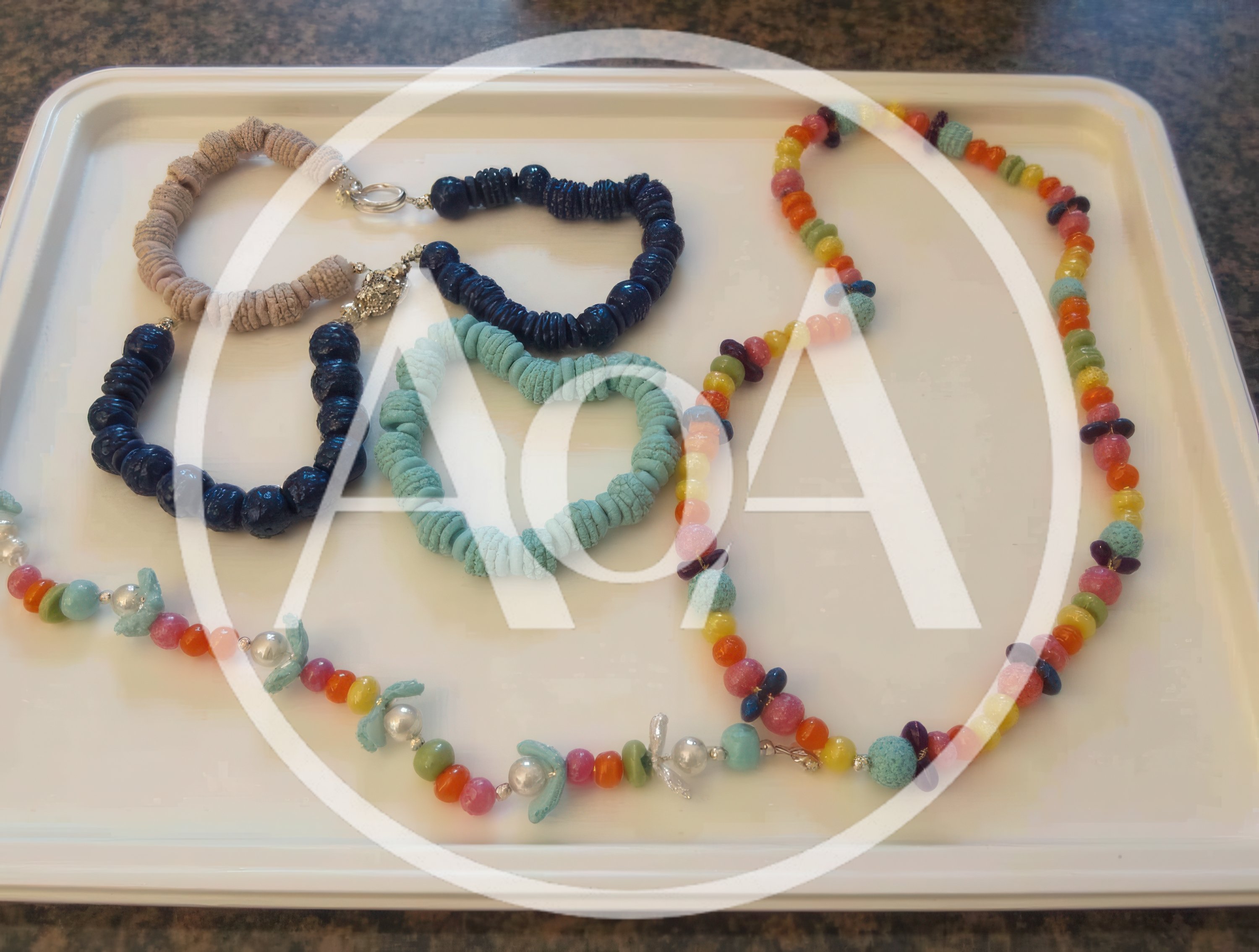 Handmade Beaded Necklaces And Bracelets On A Tray