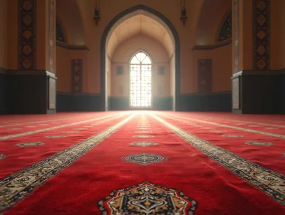 Interior View Of A Mosque With Red Prayer Carpet