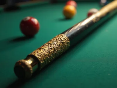 Ornate Gold Pool Cue Resting On Green Billiards Table