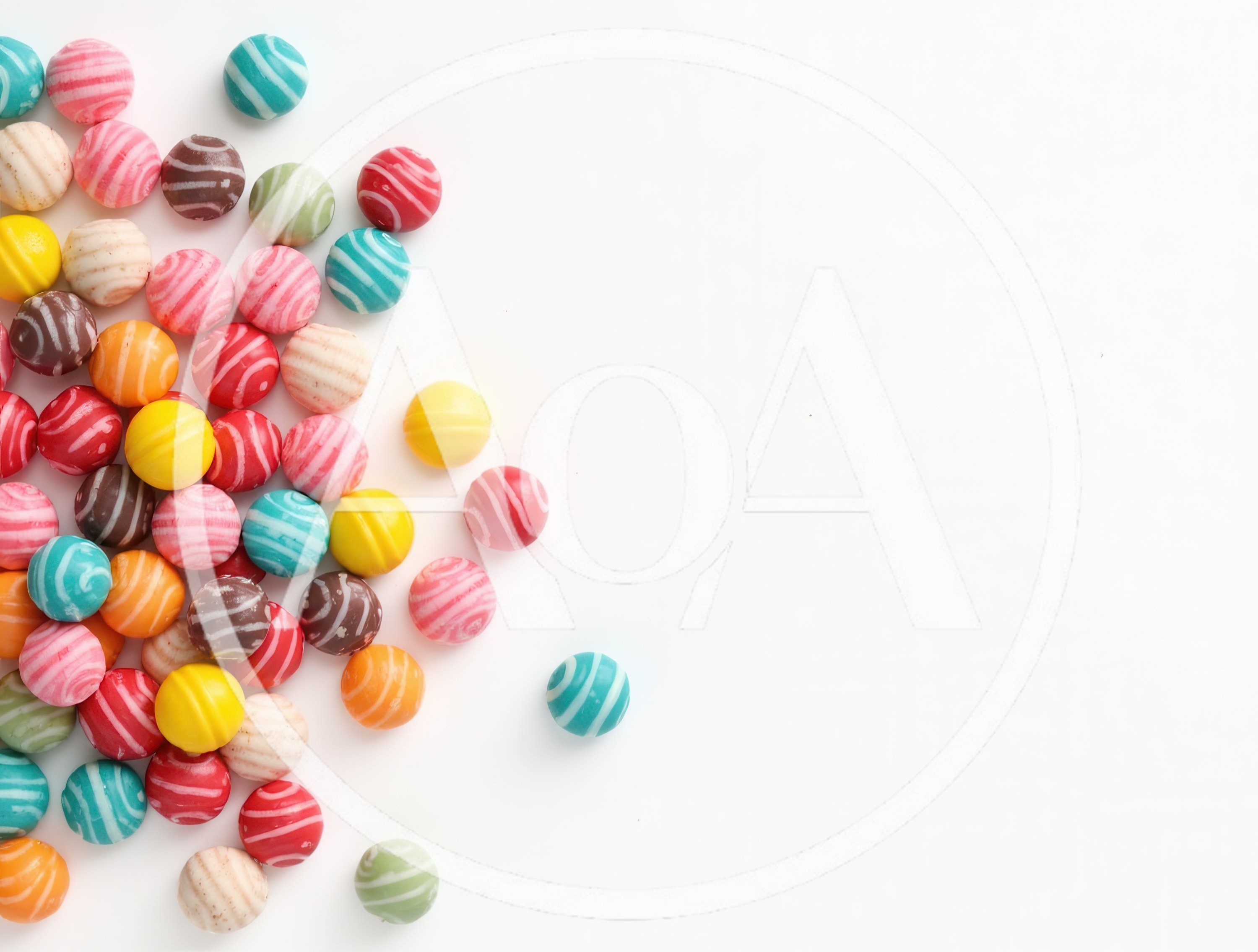 Colorful Striped Gumball Candies on White Background