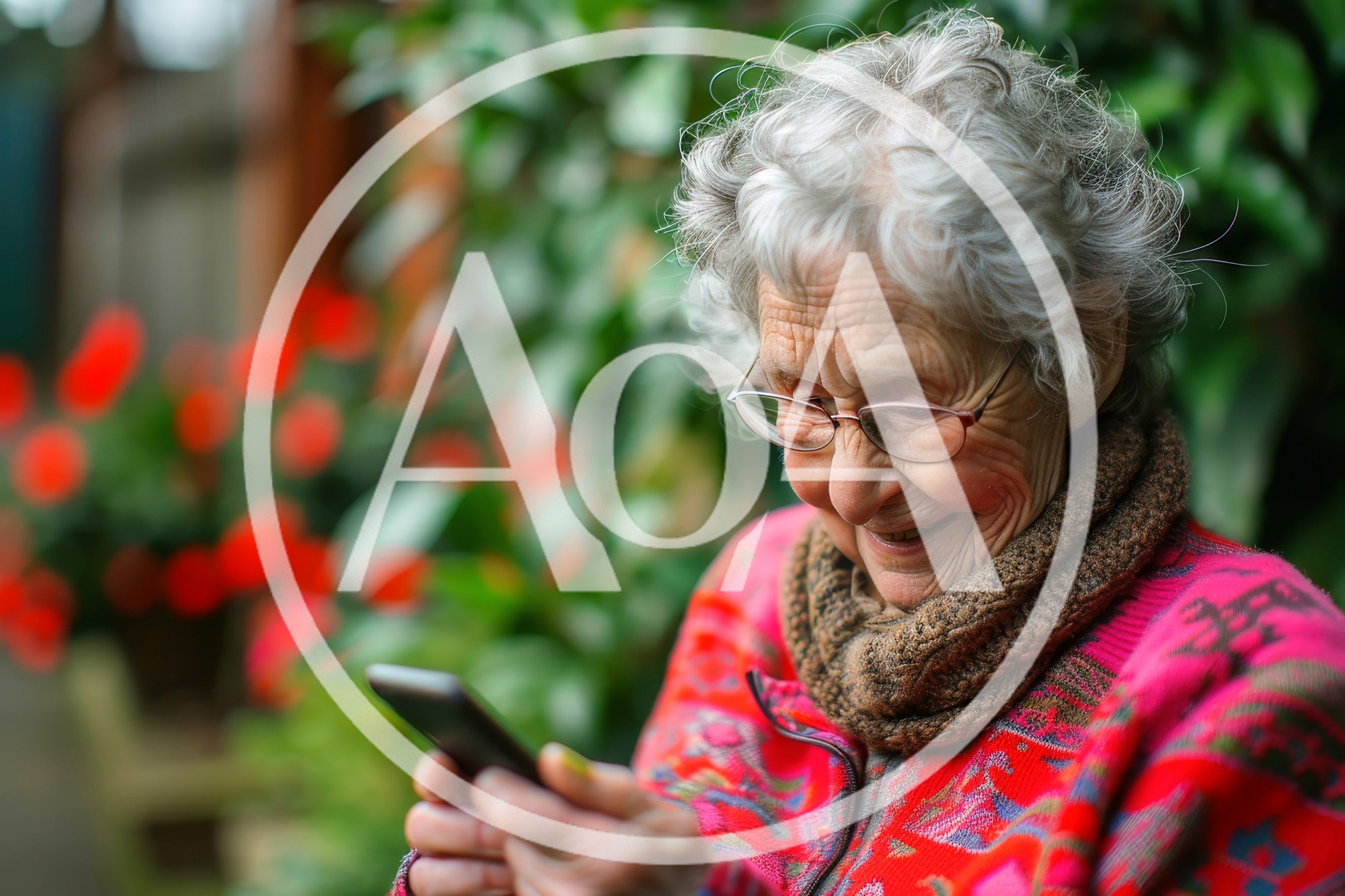 Elderly Woman Smiling While Using Her Smartphone