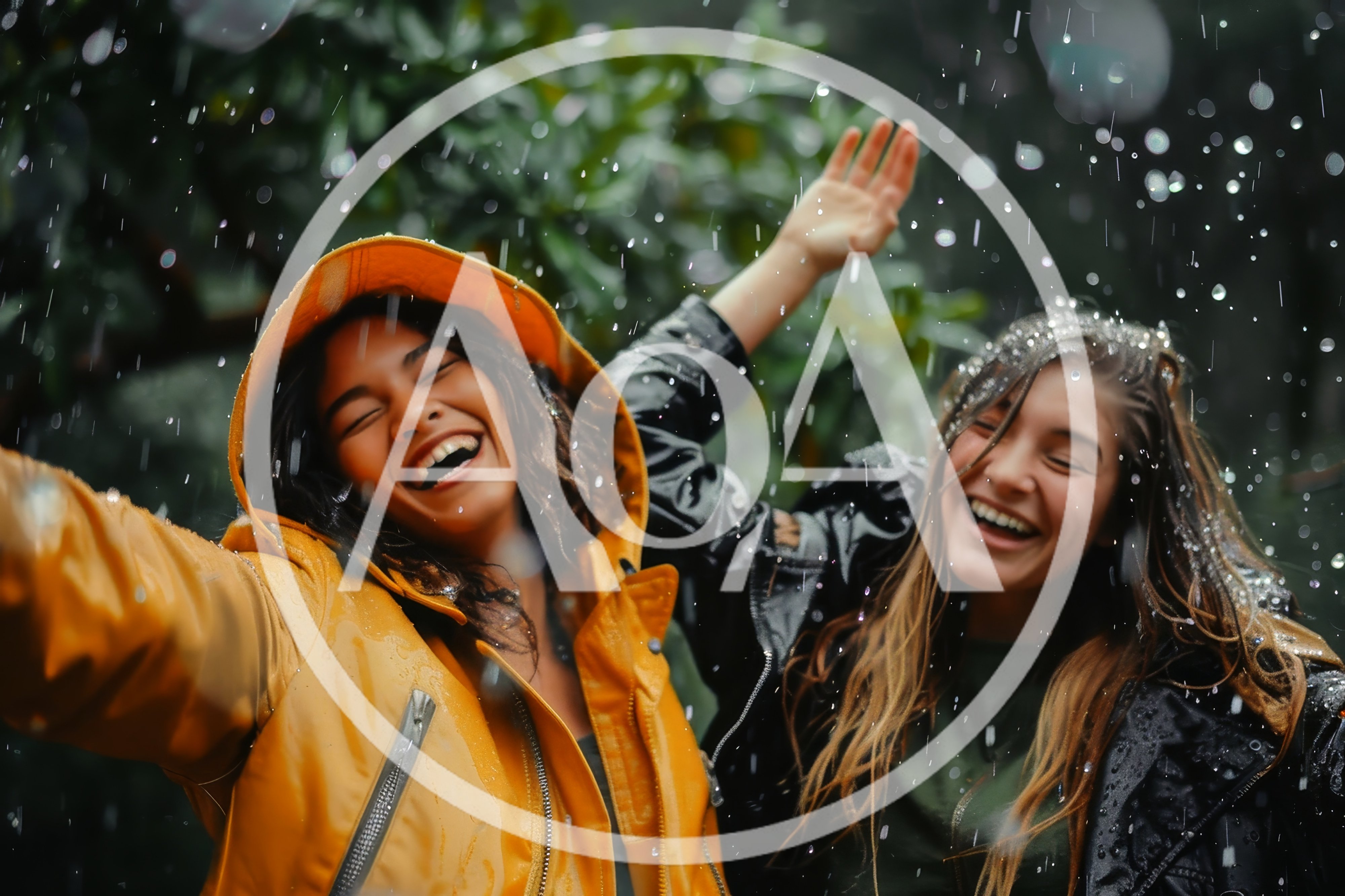 Two Happy Women Enjoying Heavy Rain Outdoors