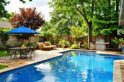 Backyard Swimming Pool With Patio And Outdoor Dining