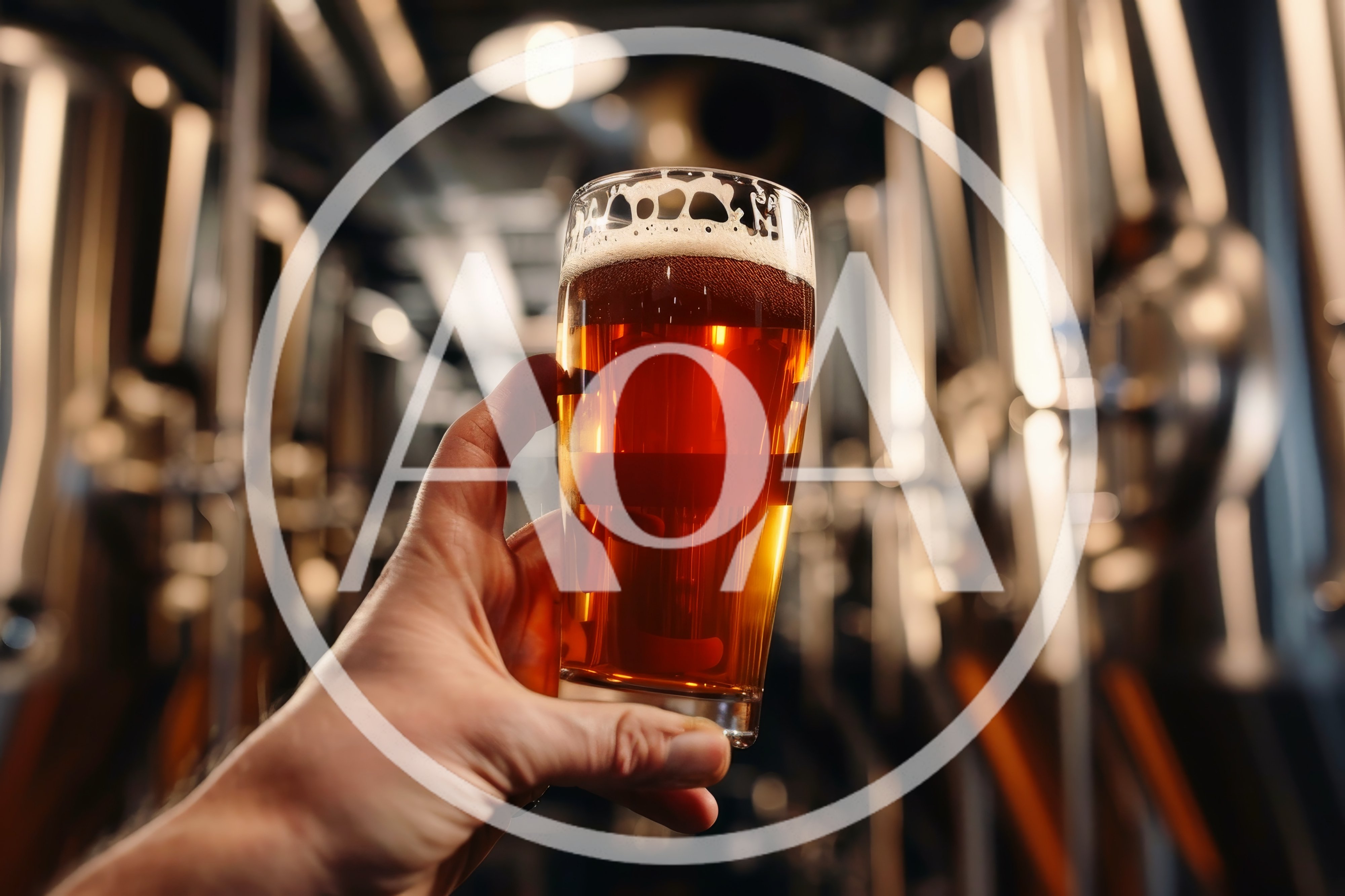 Hand Holding A Glass Of Craft Beer In A Brewery
