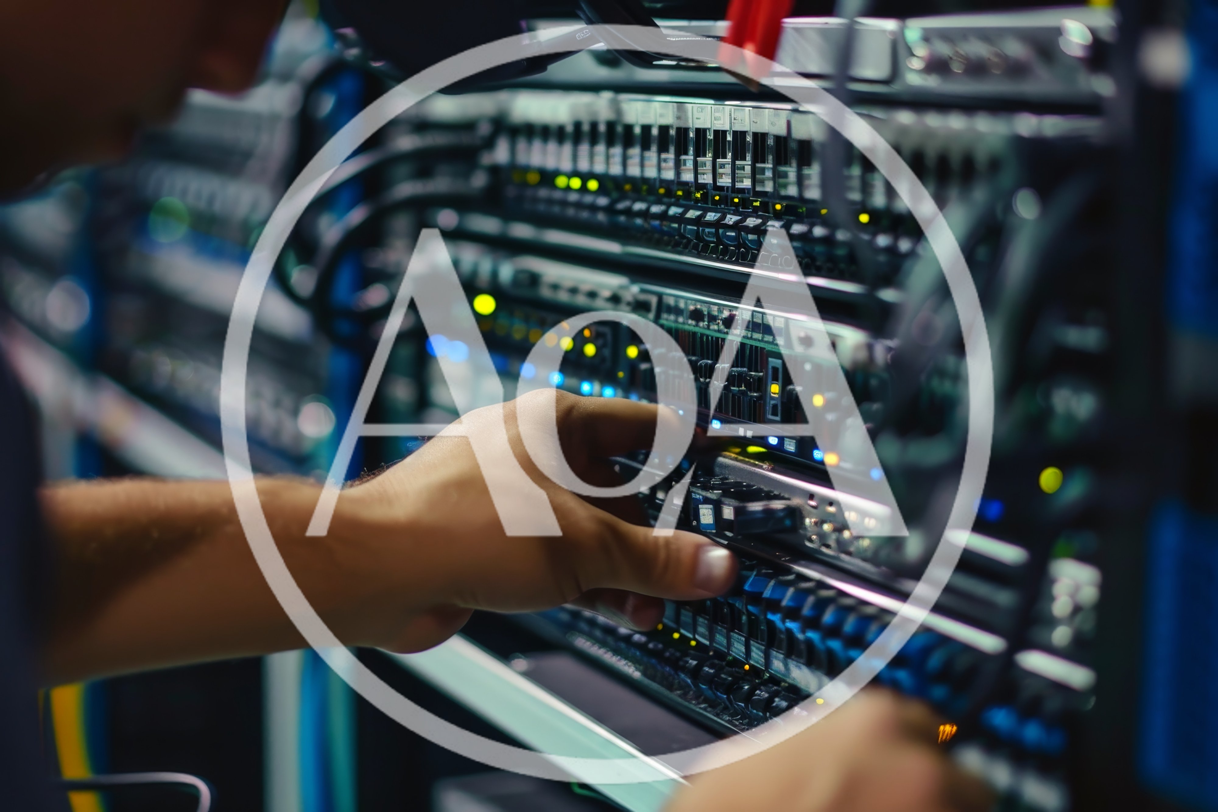 IT Technician Working On Server Rack In Data Center