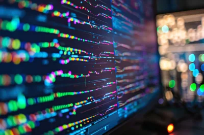 Financial Data Charts Displayed On Computer Monitor