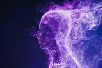 Abstract Human Silhouette Formed From Swirling Purple Smoke