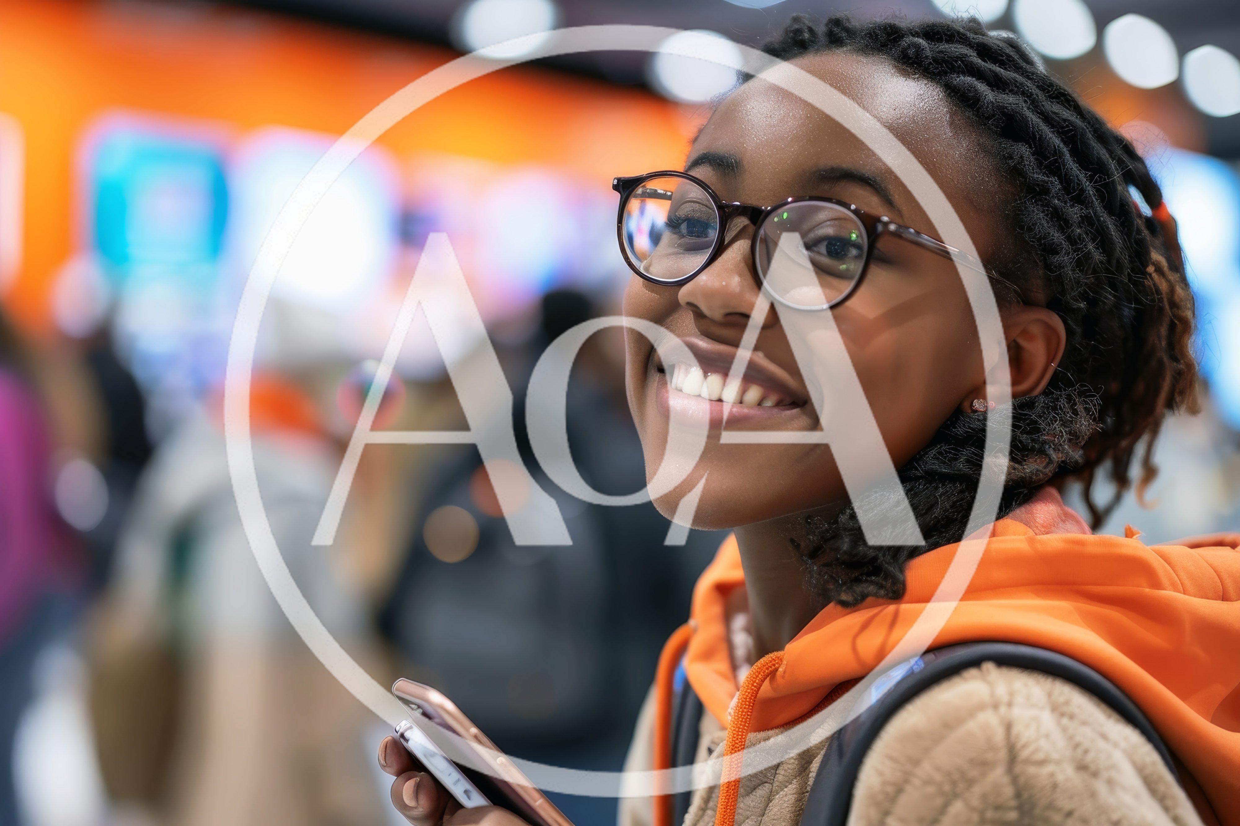 Young Woman With Braids Smiling While Holding Smartphone