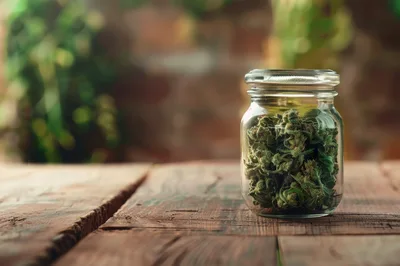 Cannabis Buds Stored In A Glass Jar