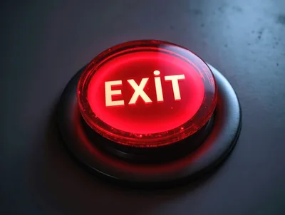 Glowing Red Exit Button On Dark Surface