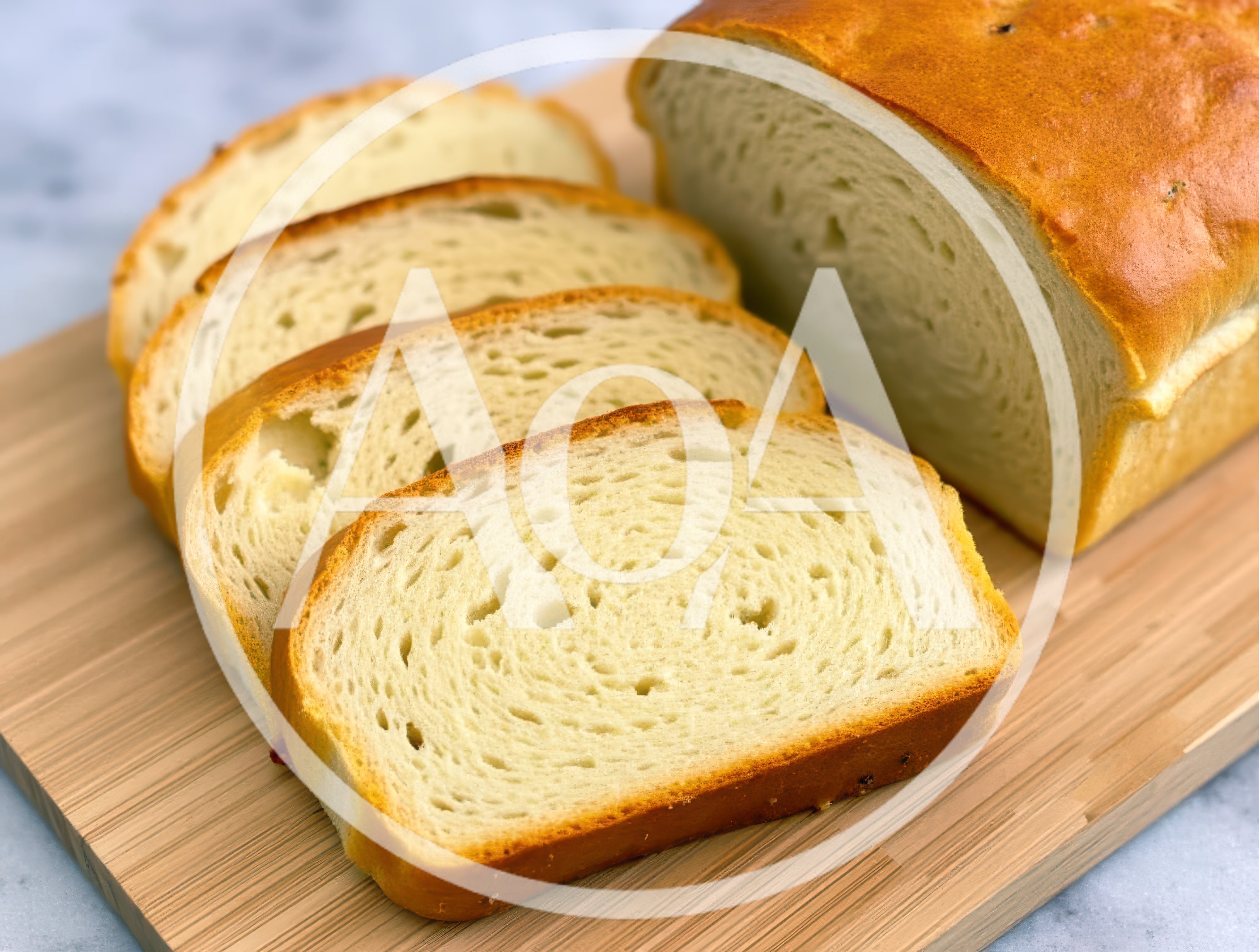 Freshly Baked Sliced White Bread Loaf on Wooden Board
