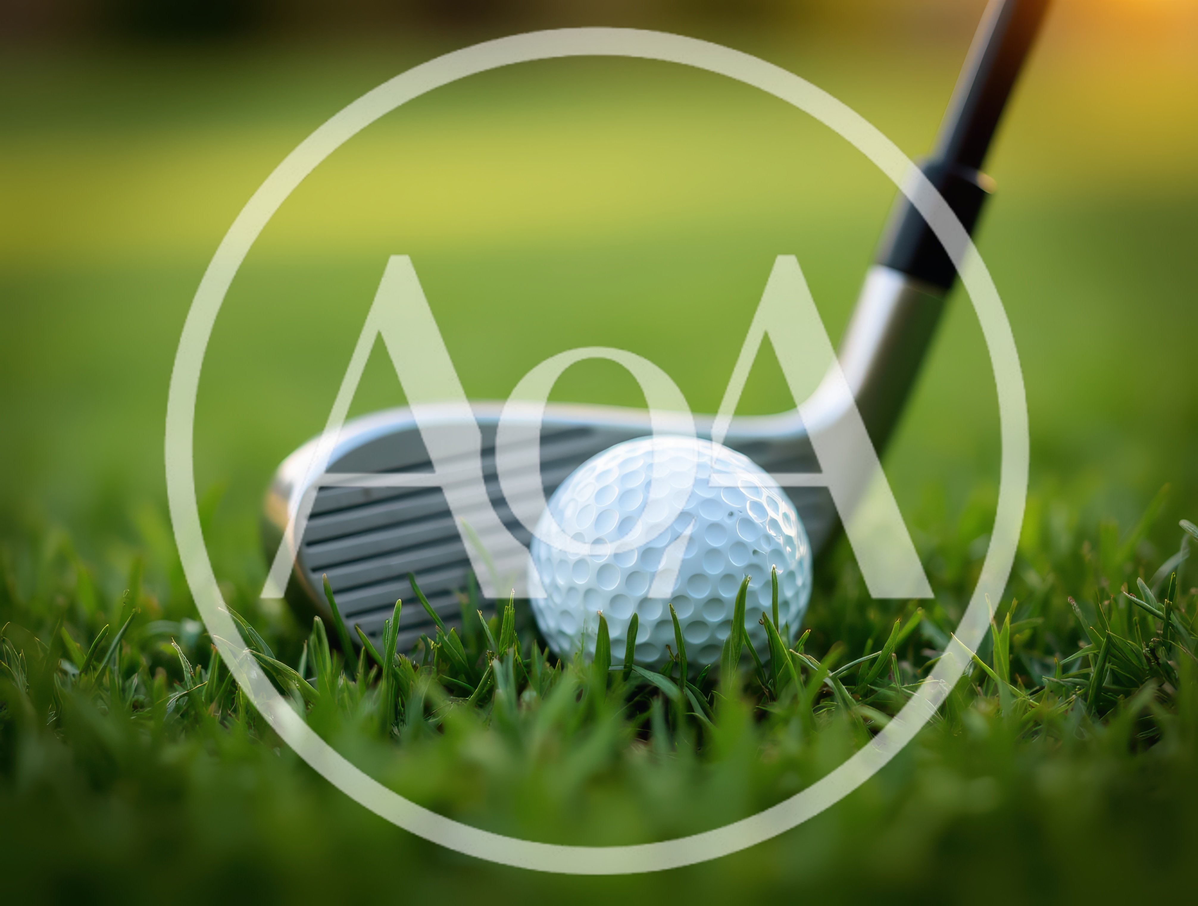 Golf Club Head Addressing A Golf Ball On Grass
