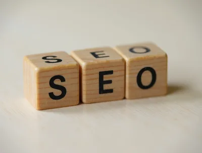 Wooden Blocks Spelling SEO On A Light Surface