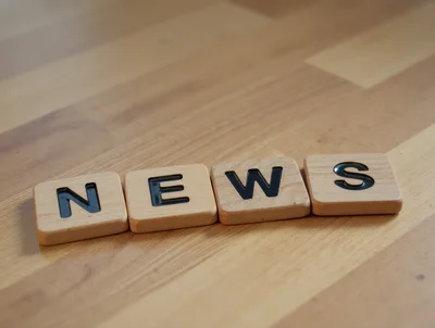Wooden Scrabble Tiles Spelling The Word News