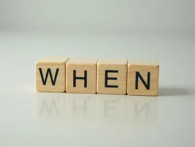 Wooden Blocks Spelling The Word When