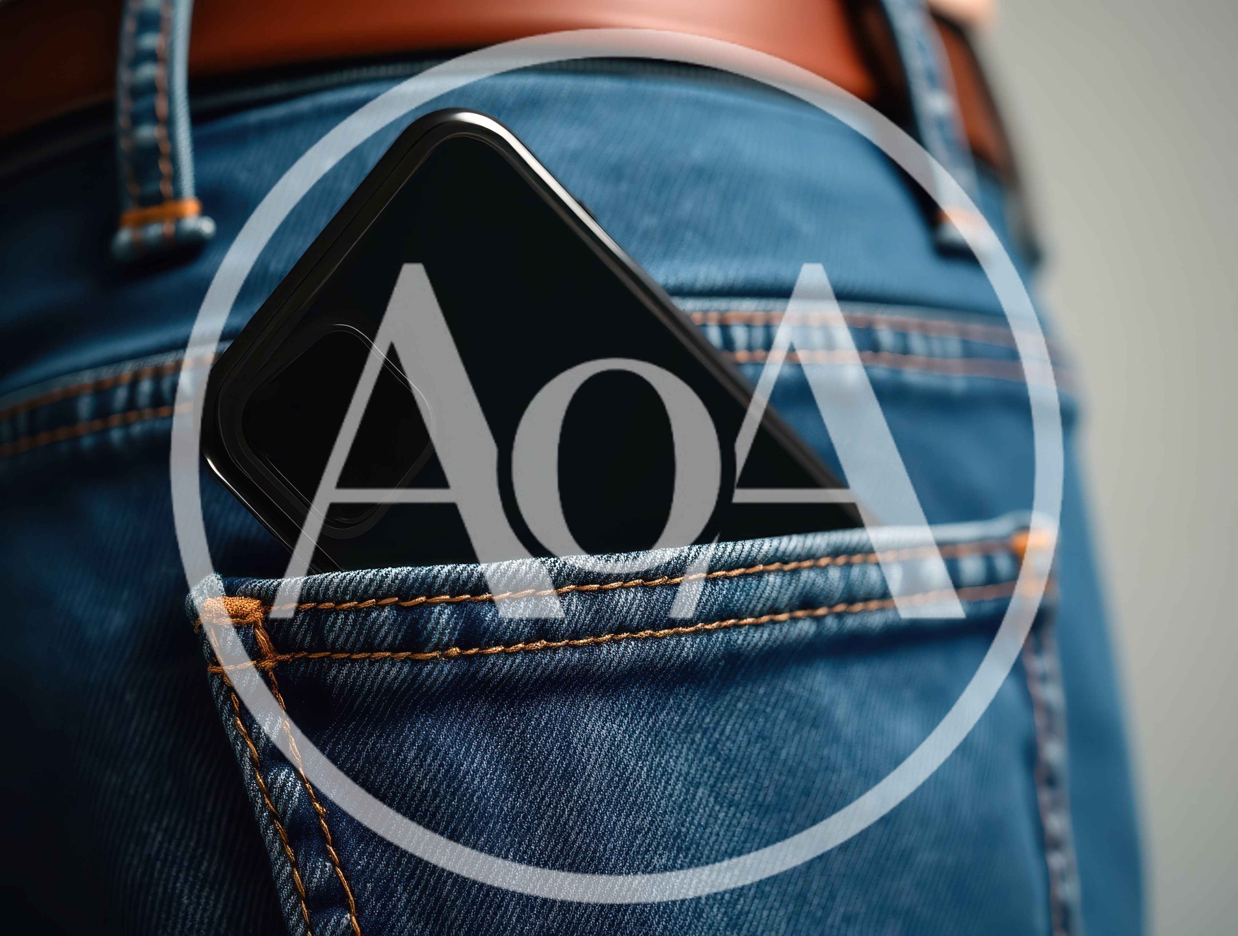 Smartphone Sticking Out Of A Blue Jeans Pocket
