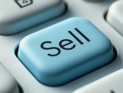 Close Up Of A Blue Sell Button On Keyboard