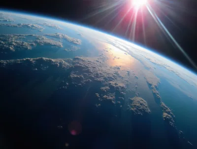 Earth Horizon View From Space With Sun Flare