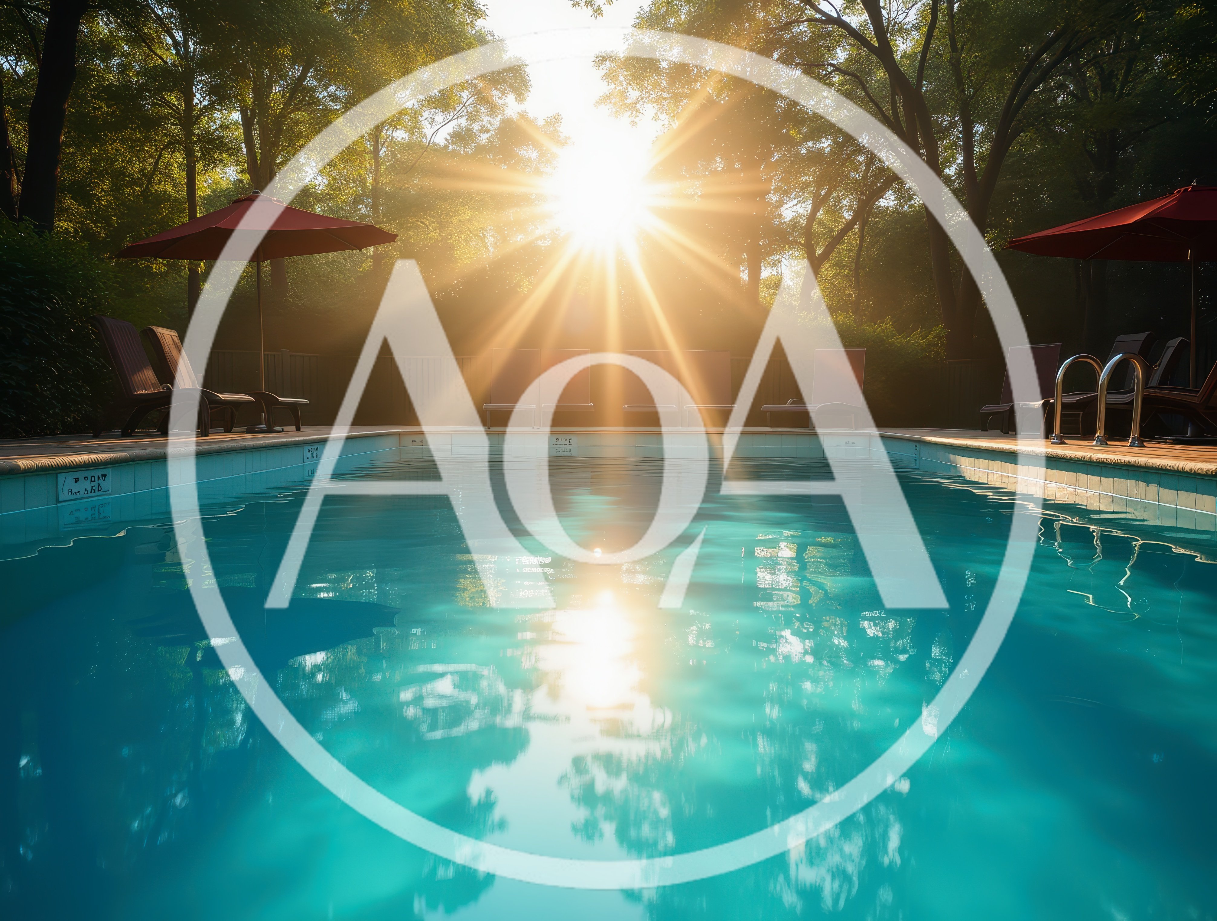 Sunlit Swimming Pool With Lounge Chairs At Sunset