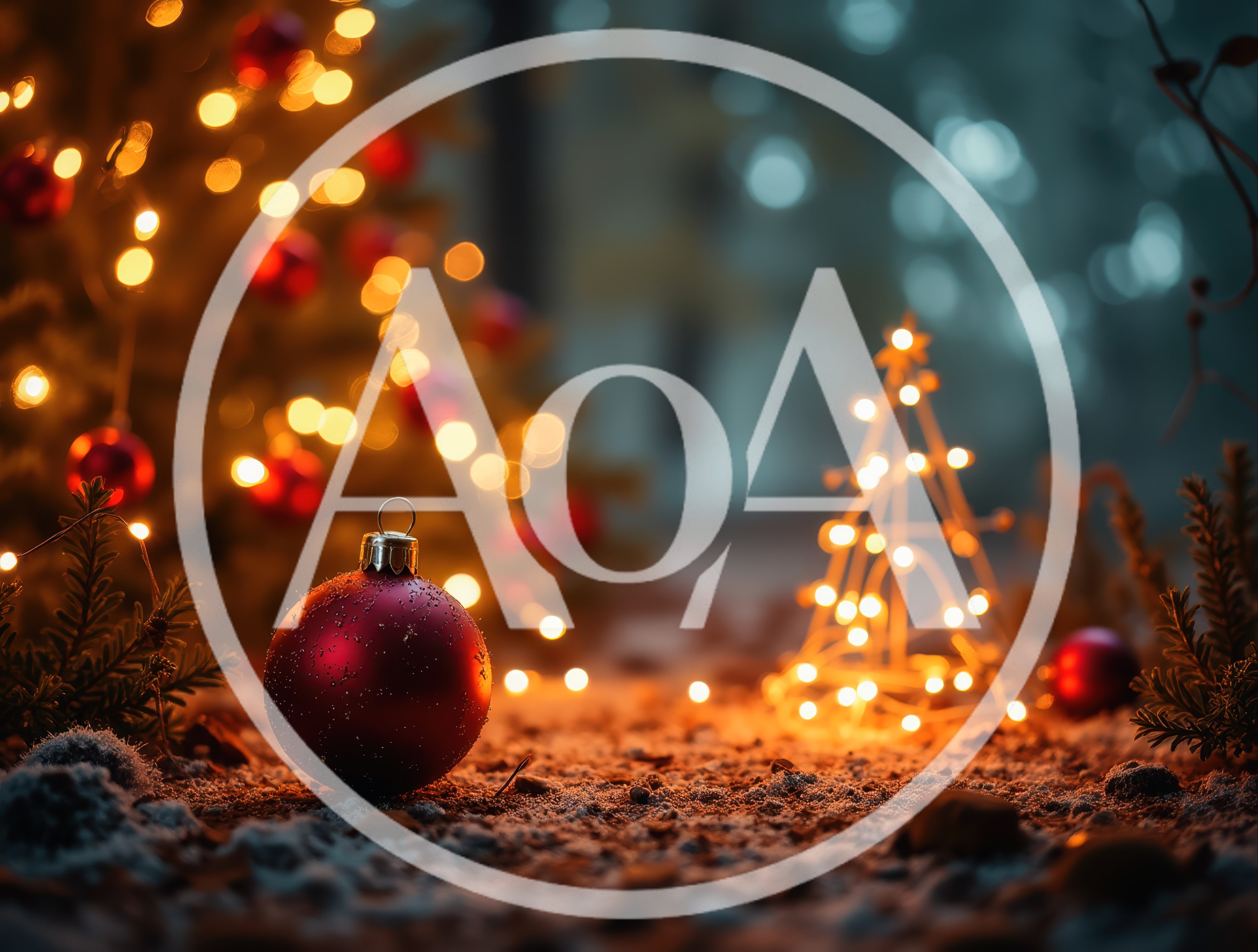 Red Christmas Ornament on Snowy Ground with Fairy Lights