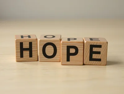 Wooden Blocks Spelling The Word Hope