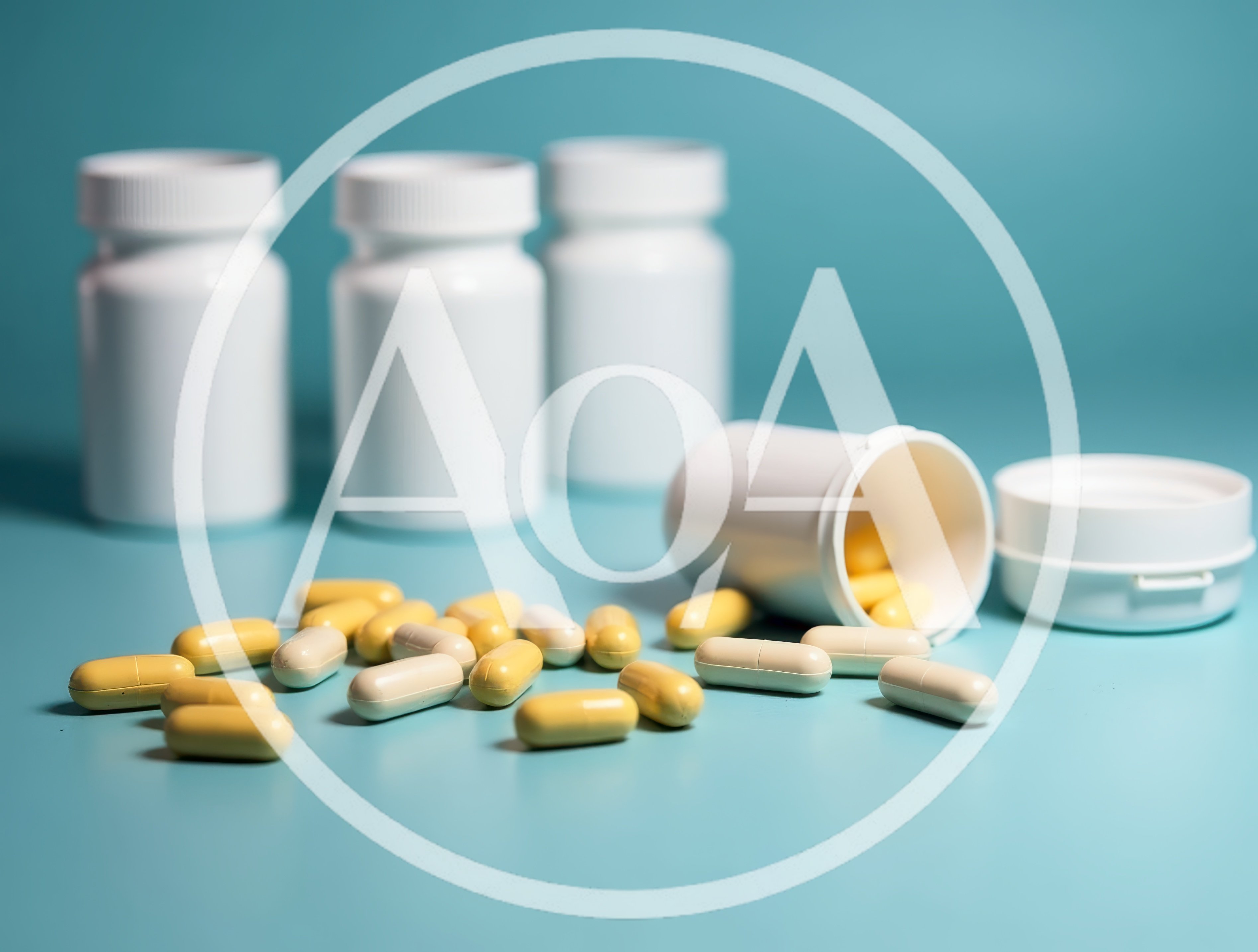 Yellow and White Capsules Spilled From Pill Bottle