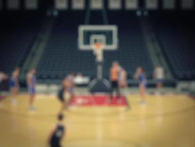 Basketball Players During A Competitive Game