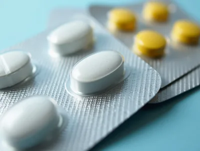 White And Yellow Pills In Blister Packs