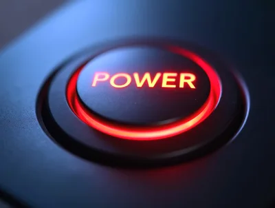 Glowing Red Power Button On Electronic Device