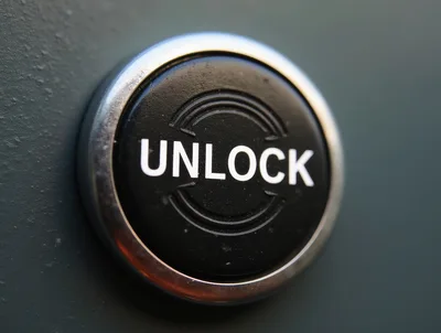 Close Up Of A Black Unlock Button