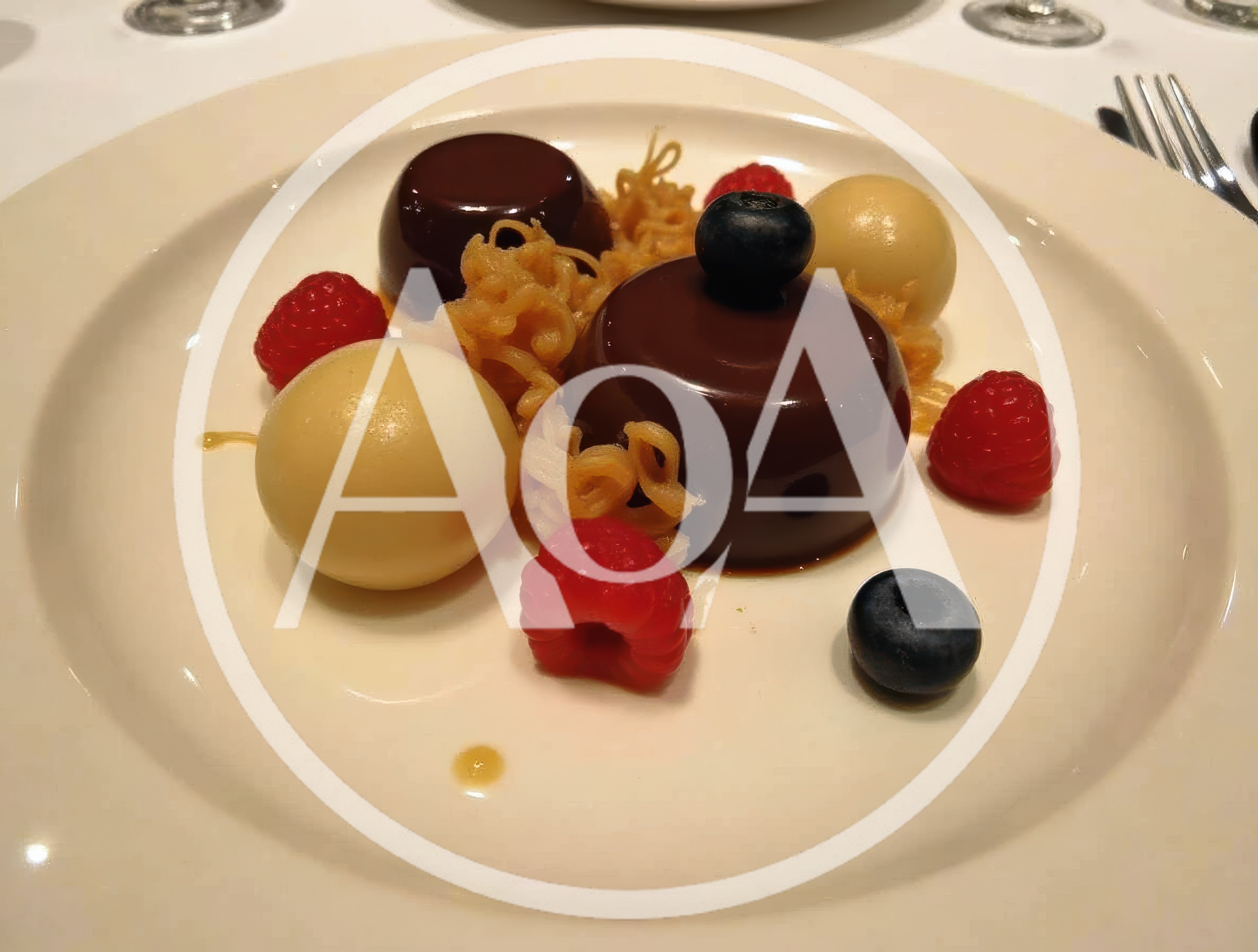 Gourmet Chocolate Dessert Plated With Berries