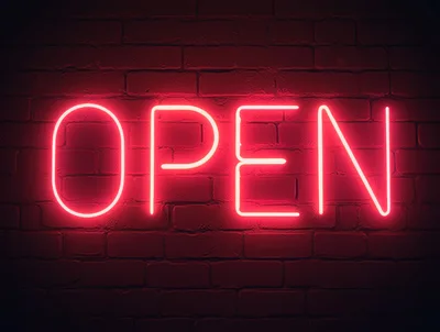 Red Neon Open Sign On Dark Brick Wall