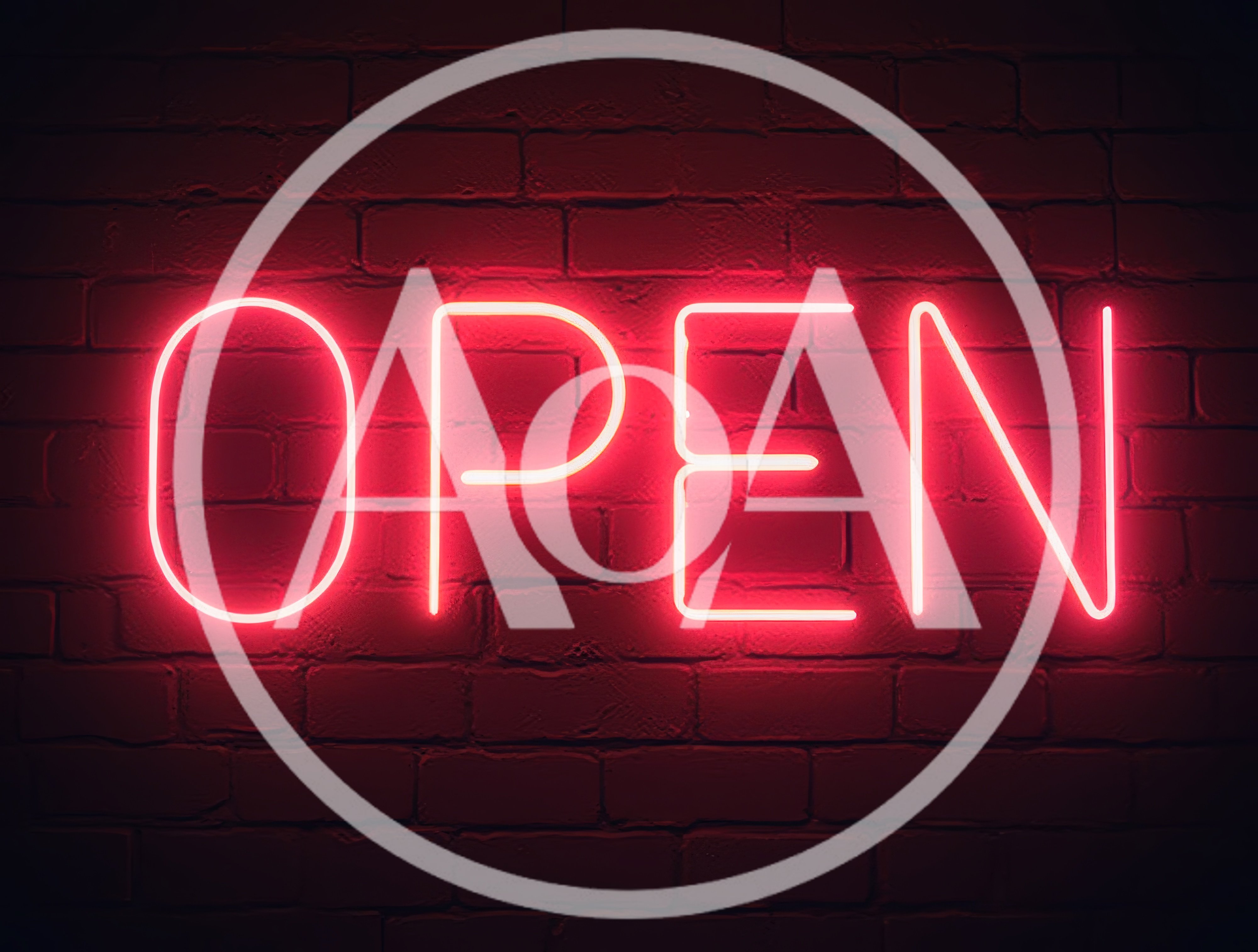 Red Neon Open Sign On Dark Brick Wall
