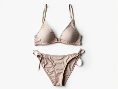 Beige Bikini Set On White Background