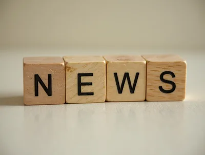 Wooden Blocks Spelling The Word News
