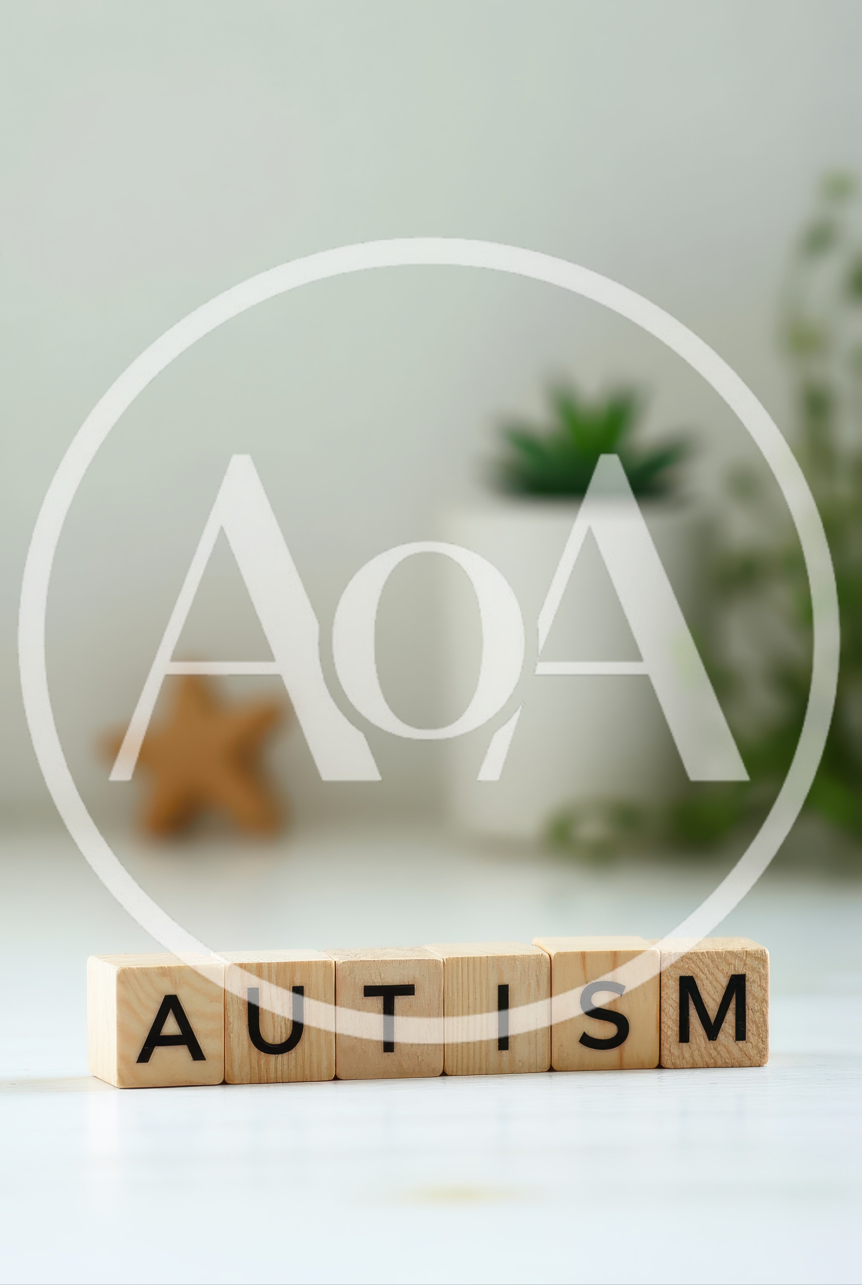 Wooden Blocks Spelling Autism on White Surface