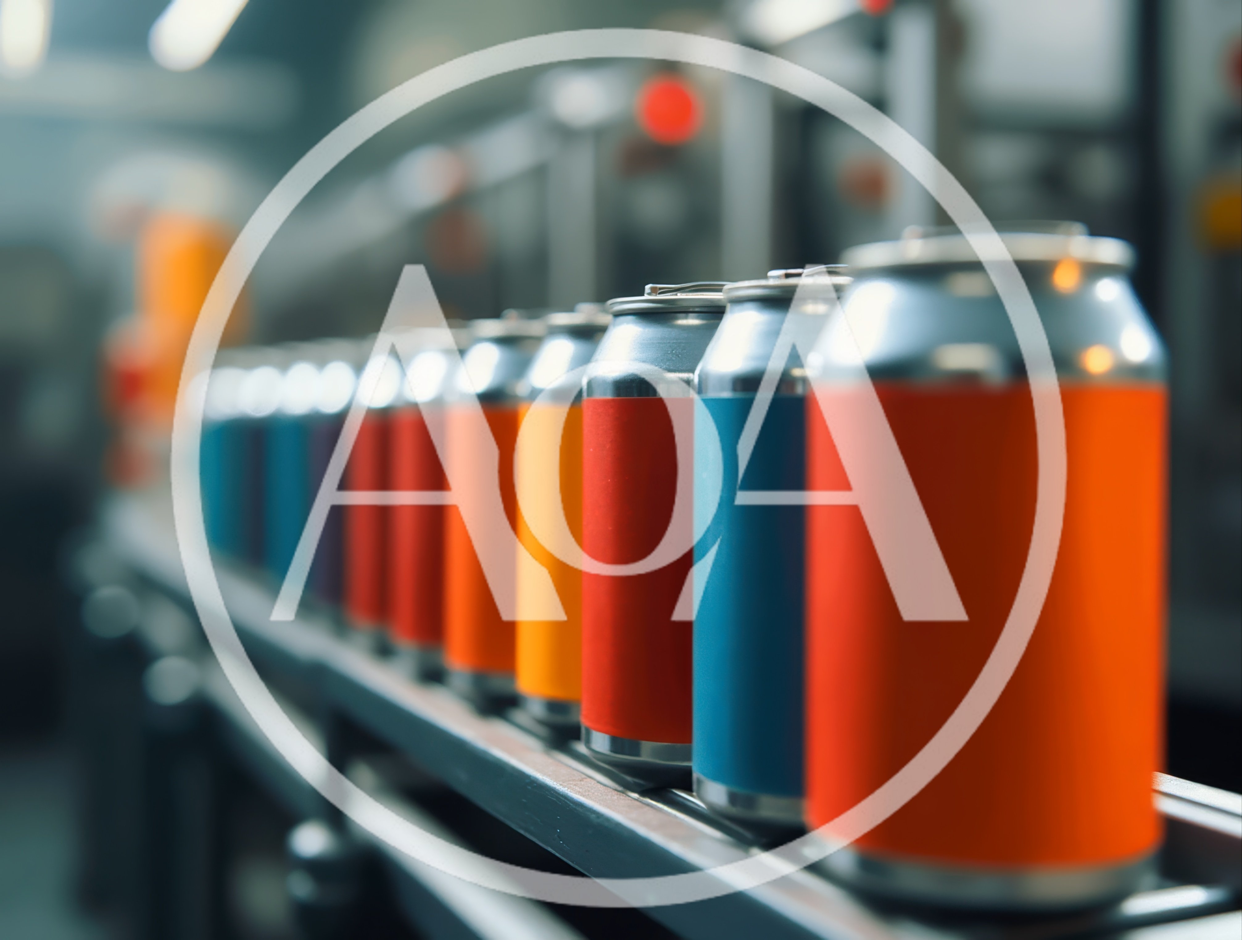 Aluminum Beverage Cans Moving Along Industrial Conveyor Belt