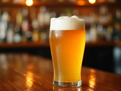 Cold Glass Of Craft Beer On A Bar Counter