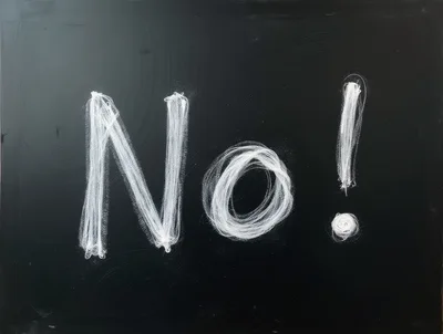 Handwritten No With Exclamation Mark On Chalkboard