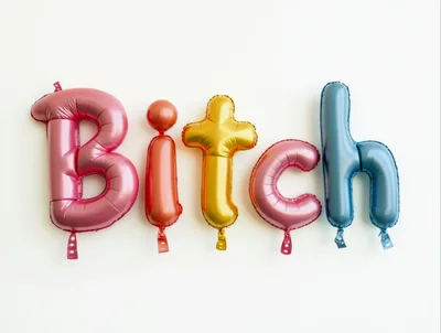 Colorful Foil Balloon Letters Spelling Out Bitch