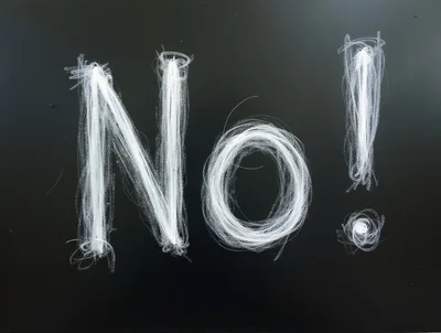 White Chalk Writing No Exclamation Mark On Blackboard