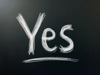 Yes Written In White Chalk On A Blackboard