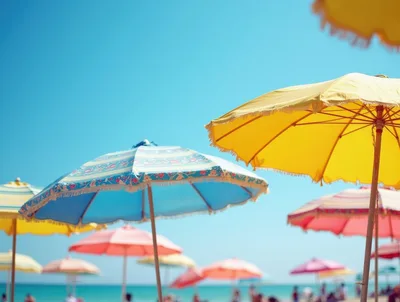 Colorful Beach Umbrellas Under A Clear Blue Sky