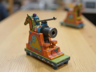 Vintage Colorful Wooden Toy Cannon On Wheels