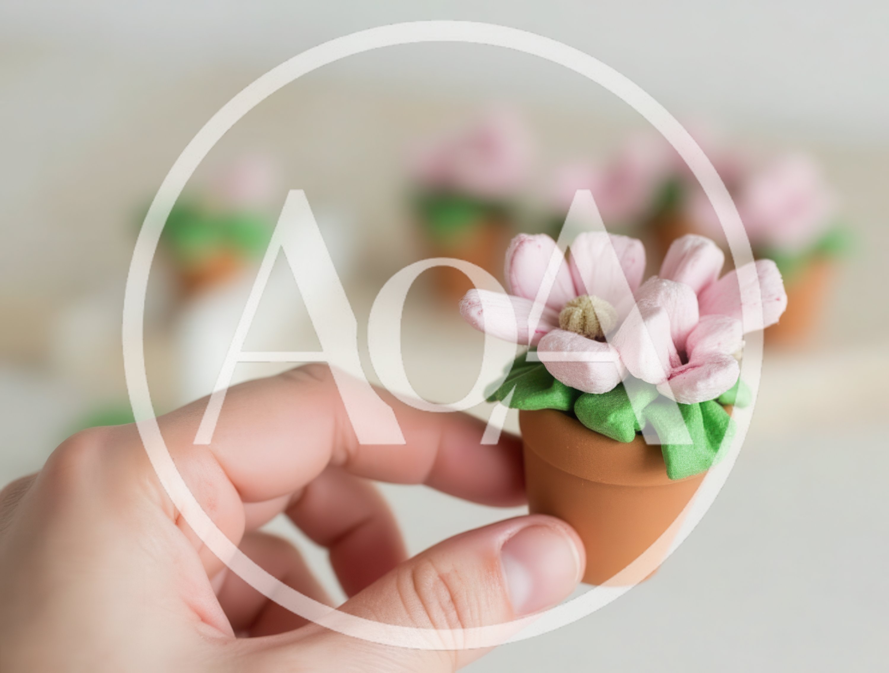 Hand Holding A Miniature Potted Flower Craft