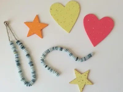 Craft Supplies Including Beaded Necklaces And Decorative Shapes