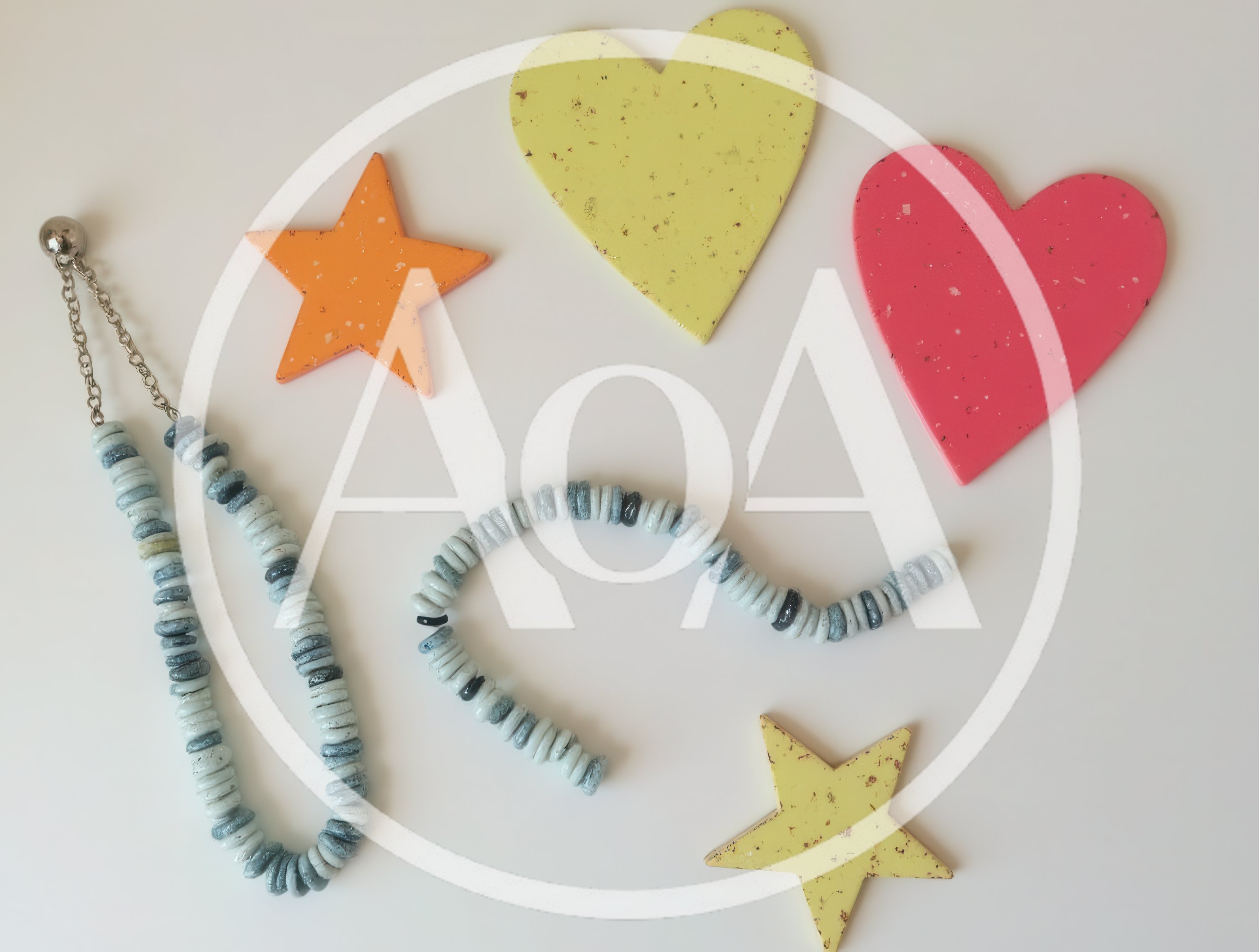 Craft Supplies Including Beaded Necklaces And Decorative Shapes