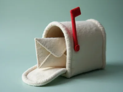 Felt Mailbox With Envelope On Pastel Background